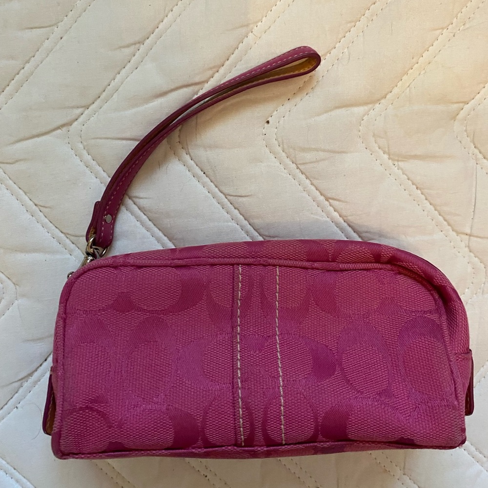 Hot pink coach makeup bag